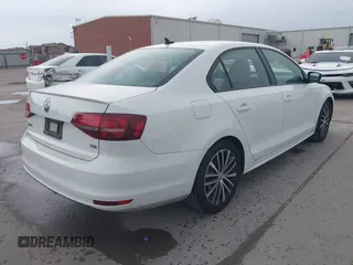 2016 Volkswagen Jetta Sport z VIN 3VWD17AJ1GM334234, wystawiony jako IAAI lot #42299618 z przebiegiem 86 143 mil mil oraz . Historia ofert i sprzedaży dostępna na DreamBid. Obrazek 4.
