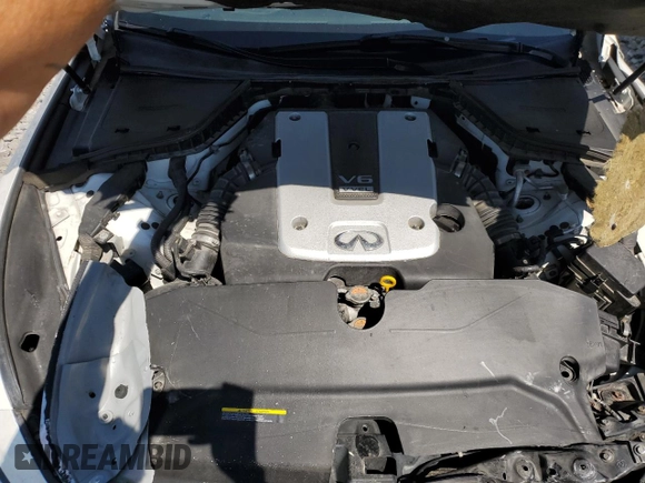 2014 Infiniti Q50 Premium z VIN JN1BV7AR0EM705108, wystawiony jako Copart lot #58990385 z przebiegiem 138 110 mil mil oraz Szkoda całkowita • Salvage title. Historia ofert i sprzedaży dostępna na DreamBid. Obrazek 12.