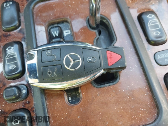 2002 Mercedes-Benz E-Class with VIN WDBJF65J92B479841, listed as a IAAI auction lot 41471955 with 203,527 mi miles. Bid and sale history available at carsss.com. Image 11.