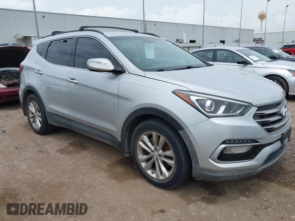 2018 Hyundai Santa Fe 2.0T z VIN 5XYZU4LA9JG537310, wystawiony jako IAAI lot #42393689 z przebiegiem Nie podano mil oraz . Historia ofert i sprzedaży dostępna na DreamBid. Obrazek 1.