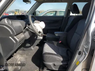 2012 Scion xB with VIN JTLZE4FE1CJ009084, listed as a Copart auction lot 50447785 with 74,155 mi miles and Salvage Title. Bid and sale history available at carsss.com. Image 7.