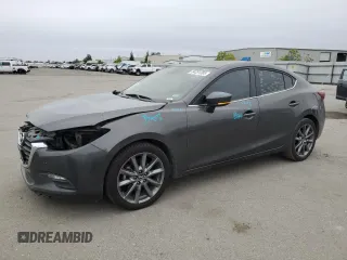 2018 Mazda 3 Touring z VIN 3MZBN1V39JM177225, wystawiony jako Copart lot #54351285 z przebiegiem 94 572 mil mil oraz Szkoda całkowita • Salvage title. Historia ofert i sprzedaży dostępna na DreamBid. Obrazek 1.