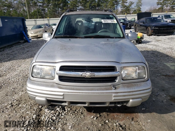 2004 Chevrolet Tracker LT z VIN 2CNBE634346901609, wystawiony jako Copart lot #86977504 z przebiegiem 59 089 mil mil oraz Szkoda całkowita • Salvage title. Historia ofert i sprzedaży dostępna na DreamBid. Obrazek 5.
