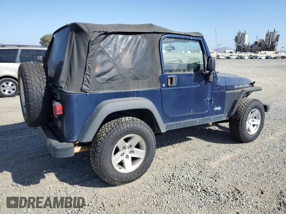 2005 Jeep Wrangler Rubicon with VIN 1J4FA69S05P351725, listed as a Copart auction lot 71411904 with 144,557 mi miles and Salvage Title. Bid and sale history available at carsss.com. Image 3.