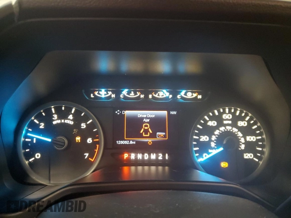 2015 Ford F-150 XLT with VIN 1FTEW1EP7FFC49319, listed as a Copart auction lot 56142895 with 125,052 mi miles and Salvage title. Bid and sale history available at DreamBid. Image 9.