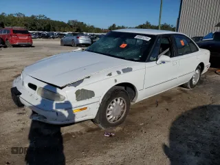 1996 Oldsmobile 88 1SA with VIN 1G3HN52KXT4800284, listed as a Copart auction lot 84081214 with 185,447 mi miles and Salvage Title. Bid and sale history available at DreamBid. Image 1.