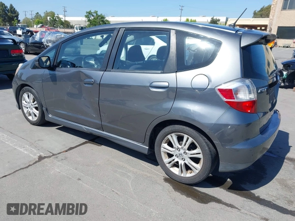 2011 Honda Fit Sport with VIN JHMGE8H52BC006588, listed as a IAAI auction lot 42205351 with 178,981 mi miles and . Bid and sale history available at DreamBid. Image 3.