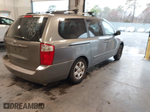 2010 Kia Sedona LX with VIN KNDMG4C31A6331565, listed as a IAAI auction lot 41860255 with 219,233 mi miles. Bid and sale history available at carsss.com. Image 4.