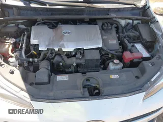 2022 Toyota Prius L Eco with VIN JTDKAMFUXN3181752, listed as a IAAI auction lot 42015717 with 129,637 mi miles and . Bid and sale history available at DreamBid. Image 10.