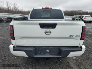 2023 Nissan Frontier PRO-4X with VIN 1N6ED1EK6PN657177, listed as a Copart auction lot 52156285 with 27,115 mi miles and Salvage Title. Bid and sale history available at carsss.com. Image 6.