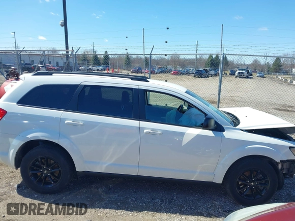 2020 Dodge Journey SE Value with VIN 3C4PDCABXLT265228, listed as a IAAI auction lot 41843599 with 53,797 mi miles and . Bid and sale history available at carsss.com. Image 13.