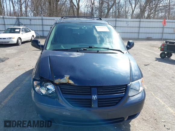 2007 Dodge Caravan SXT with VIN 1D4GP45R07B161443, listed as a IAAI auction lot 41829566 with 83,810 mi miles and . Bid and sale history available at carsss.com. Image 12.