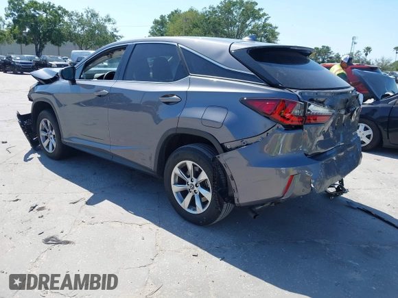 2019 Lexus RX with VIN 2T2ZZMCA0KC132043, listed as a IAAI auction lot 42001021 with 23,663 mi miles. Bid and sale history available at carsss.com. Image 3.