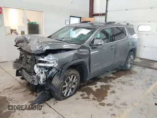 2021 GMC Acadia SLT z VIN 1GKKNMLS5MZ230427, wystawiony jako IAAI lot #41345085 z przebiegiem 59 084 mil mil oraz . Historia ofert i sprzedaży dostępna na DreamBid. Obrazek 16.