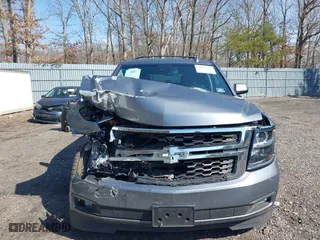 2019 Chevrolet Tahoe LT with VIN 1GNSKBKC0KR121493, listed as a IAAI auction lot 41656734 with 163,994 mi miles. Bid and sale history available at carsss.com. Image 12.