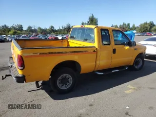 2002 Ford F-250 XL with VIN 1FTNX20L62EC53546, listed as a Copart auction lot 71931714 with 230,427 mi miles and Salvage title. Bid and sale history available at DreamBid. Image 3.