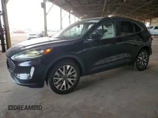 2020 Ford Escape Titanium Hybrid z VIN 1FMCU9DZ2LUB49050, wystawiony jako Copart lot #42517525 z przebiegiem 66 890 mil mil oraz Szkoda całkowita • Salvage title. Historia ofert i sprzedaży dostępna na DreamBid. Obrazek 1.