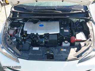 2022 Toyota Prius L Eco with VIN JTDKAMFUXN3163123, listed as a IAAI auction lot 41666679 with 68,026 mi miles. Bid and sale history available at carsss.com. Image 10.