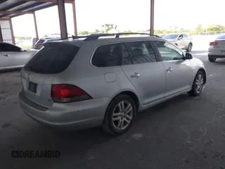 2014 Volkswagen Jetta SportWagen TDI with VIN 3VWPL7AJ0EM613453, listed as a IAAI auction lot 41637676 with 177,669 mi miles. Bid and sale history available at carsss.com. Image 4.