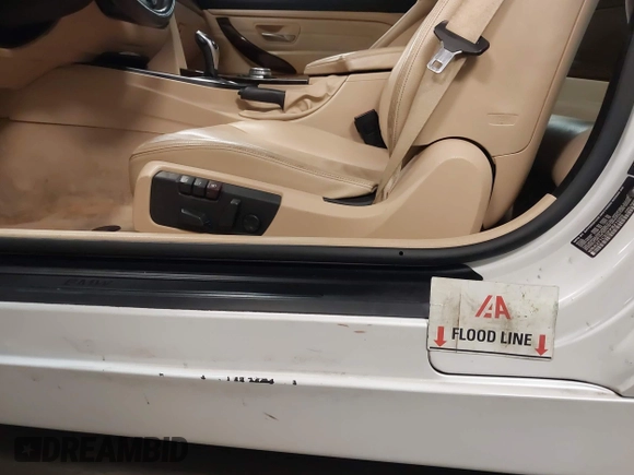 2015 BMW 4 Series 428i xDrive with VIN WBA3T1C52FP821020, listed as a IAAI auction lot 42004707 with 74,951 mi miles and . Bid and sale history available at carsss.com. Image 6.