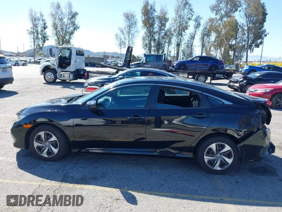 2020 Honda Civic LX z VIN 19XFC2F6XLE212683, wystawiony jako IAAI lot #41745743 z przebiegiem 81 553 mil mil oraz . Historia ofert i sprzedaży dostępna na DreamBid. Obrazek 15.