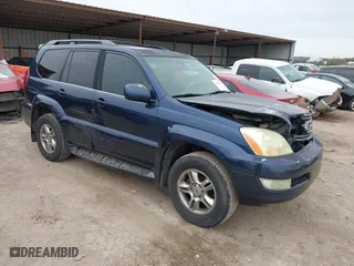 2004 Lexus GX 470 with VIN JTJBT20X340064559, listed as a IAAI auction lot 41240821 with 394,295 mi miles. Bid and sale history available at carsss.com. Image 1.