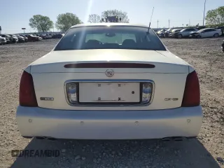 2004 Cadillac DeVille DHS z VIN 1G6KE54Y14U248539, wystawiony jako Copart lot #51995685 z przebiegiem 149 571 mil mil oraz Czysty tytuł • Clean title. Historia ofert i sprzedaży dostępna na DreamBid. Obrazek 6.