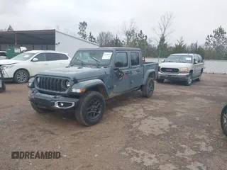 2024 Jeep Gladiator Sport z VIN 1C6HJTAG5RL127973, wystawiony jako IAAI lot #41248039 z przebiegiem 2 648 mil mil oraz . Historia ofert i sprzedaży dostępna na DreamBid. Obrazek 17.