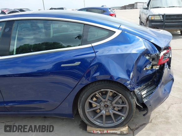 2019 Tesla Model 3 Mid Range with VIN 5YJ3E1EA5KF190453, listed as a IAAI auction lot 41880684 with 58,909 mi miles and . Bid and sale history available at carsss.com. Image 20.