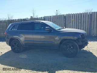2015 Jeep Grand Cherokee Altitude with VIN 1C4RJFAG4FC115470, listed as a IAAI auction lot 41718092 with 95,082 mi miles. Bid and sale history available at carsss.com. Image 13.