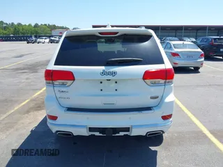 2015 Jeep Grand Cherokee Summit with VIN 1C4RJFJG1FC797711, listed as a IAAI auction lot 42026431 with 101,075 mi miles and . Bid and sale history available at DreamBid. Image 17.