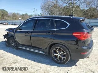 2016 BMW X1 xDrive28i with VIN WBXHT3C32GP884206, listed as a Copart auction lot 48767695 with 112,864 mi miles and Salvage Title. Bid and sale history available at carsss.com. Image 2.