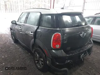 2014 MINI Countryman S with VIN WMWZC5C53EWP40677, listed as a IAAI auction lot 41473281 with 108,616 mi miles and . Bid and sale history available at DreamBid. Image 3.