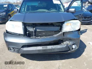 2012 Honda Pilot EX-L with VIN 5FNYF4H55CB040430, listed as a IAAI auction lot 41952800 with 247,175 mi miles and . Bid and sale history available at carsss.com. Image 6.