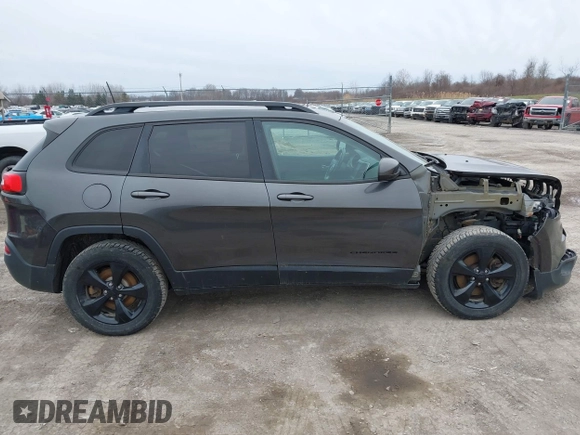 2016 Jeep Cherokee 75th Anniversary with VIN 1C4PJMCB0GW156076, listed as a IAAI auction lot 41946760 with 105,571 mi miles. Bid and sale history available at carsss.com. Image 14.