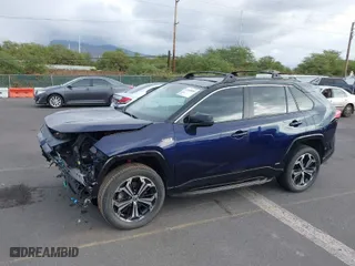 2021 Toyota RAV4 Prime XSE with VIN JTMFB3FV9MD043663, listed as a IAAI auction lot 41288884 with 45,543 mi miles. Bid and sale history available at carsss.com. Image 6.