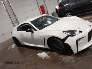 2023 Toyota 86 Premium z VIN JF1ZNBE1XP9765718, wystawiony jako IAAI lot #41945549 z przebiegiem 12 942 mil mil oraz . Historia ofert i sprzedaży dostępna na DreamBid. Obrazek 12.