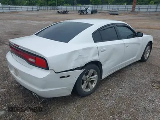 2014 Dodge Charger SE with VIN 2C3CDXBG5EH277920, listed as a IAAI auction lot 42109354 with 146,615 mi miles and . Bid and sale history available at carsss.com. Image 4.