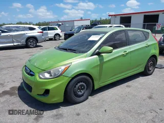 2012 Hyundai Accent SE with VIN KMHCU5AE4CU050210, listed as a IAAI auction lot 42134803 with 137,797 mi miles. Bid and sale history available at carsss.com. Image 2.