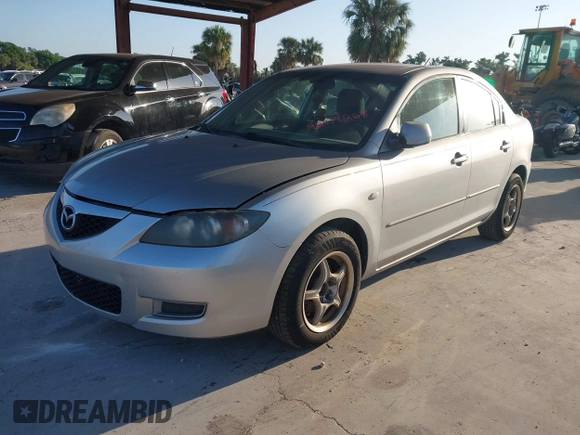 2007 Mazda Mazda3 i Sport with VIN JM1BK12F371721654, listed as a IAAI auction lot 42019268 with 120,518 mi miles. Bid and sale history available at carsss.com. Image 2.