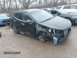 2017 Hyundai Santa Fe Ultimate z VIN 5XYZW4LAXHG484606, wystawiony jako IAAI lot #41082802 z przebiegiem 81 044 mil mil oraz . Historia ofert i sprzedaży dostępna na DreamBid. Obrazek 1.