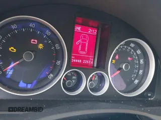 2009 Volkswagen GTI z VIN WVWGD71K19W107094, wystawiony jako IAAI lot #42287497 z przebiegiem 134 448 mil mil oraz . Historia ofert i sprzedaży dostępna na DreamBid. Obrazek 7.