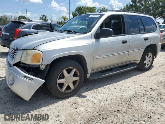 2007 GMC Envoy SLT with VIN 1GKDS13SX72163482, listed as a Copart auction lot 72439864 with 218,719 mi miles and Salvage Title. Bid and sale history available at carsss.com. Image 1.