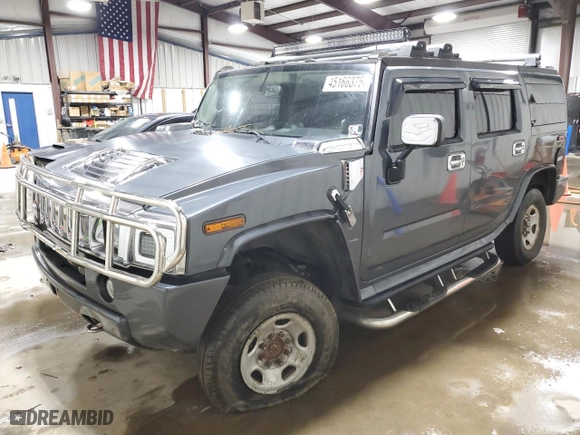 2003 Hummer H2 with VIN 5GRGN23U73H127407, listed as a Copart auction lot 45166375 with 105,913 mi miles and Salvage Title. Bid and sale history available at carsss.com. Image 1.
