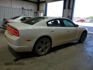 2014 Dodge Charger SXT Plus with VIN 2C3CDXJG4EH264500, listed as a Copart auction lot 64950504 with 156,850 mi miles and Salvage Title. Bid and sale history available at carsss.com. Image 3.