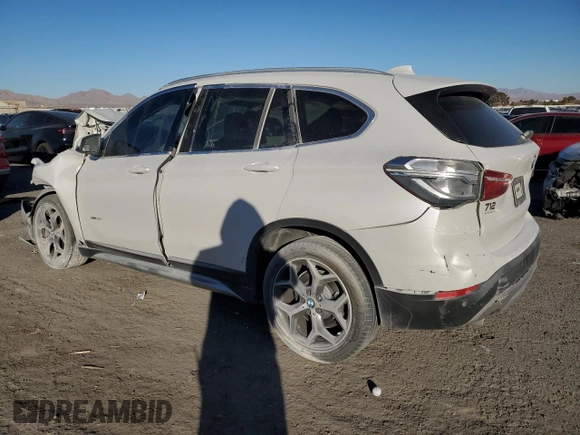 2018 BMW X1 xDrive28i with VIN WBXHT3C36J5K21286, listed as a Copart auction lot 88702365 with 0 mi miles and Salvage Title. Bid and sale history available at carsss.com. Image 2.