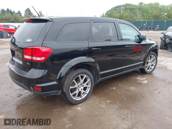 2015 Dodge Journey R/T with VIN 3C4PDDEG1FT554904, listed as a IAAI auction lot 42415888 with 143,039 mi miles and . Bid and sale history available at DreamBid. Image 4.