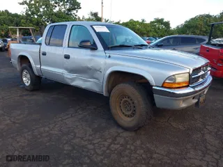 2002 Dodge Dakota SLT with VIN 1B7HG48N02S621459, listed as a IAAI auction lot 41689761 with 149,446 mi miles. Bid and sale history available at carsss.com. Image 1.