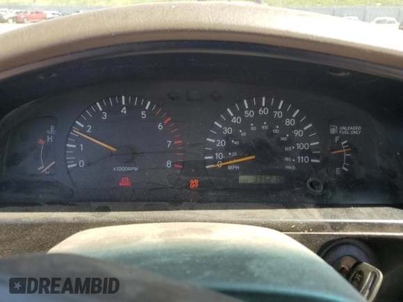 1999 Toyota Tacoma with VIN 4TAWN72N4XZ560411, listed as a Copart auction lot 61499925 with 395,215 mi miles and Salvage title. Bid and sale history available at DreamBid. Image 9.