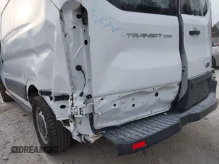2015 Ford Transit Cargo with VIN 1FTNR1ZM2FKB13159, listed as a IAAI auction lot 41331967 with 152,715 mi miles and . Bid and sale history available at DreamBid. Image 6.